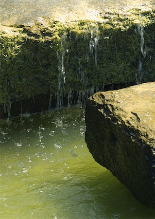 Water running over stones blocks, close-up Stock Photo - Premium Royalty-Free, Code: 633-01274616