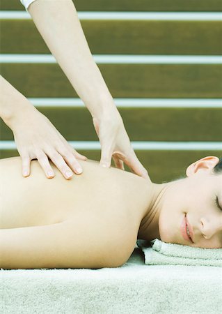 simsearch:632-01153443,k - Woman having back massage Stock Photo - Premium Royalty-Free, Code: 633-01274734