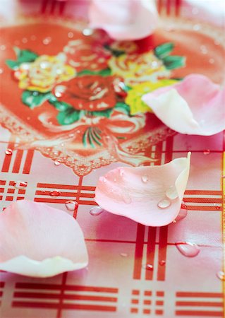 simsearch:633-01274235,k - Rose petals and drops of water on decorative tablecloth Stock Photo - Premium Royalty-Free, Code: 633-01274878