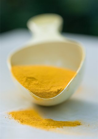 Turmeric powder Stock Photo - Premium Royalty-Free, Code: 633-01272303