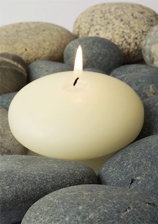 Candle burning, on stones Stock Photo - Premium Royalty-Free, Code: 633-01272318
