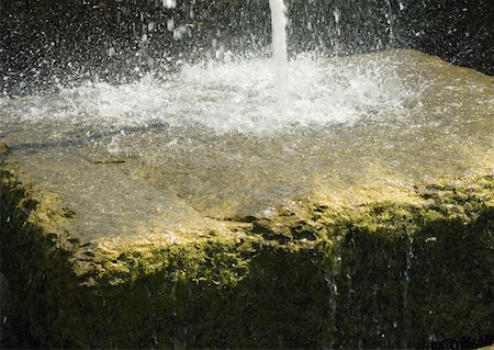 Water pouring onto stone block Stock Photo - Premium Royalty-Free, Code: 633-01272365