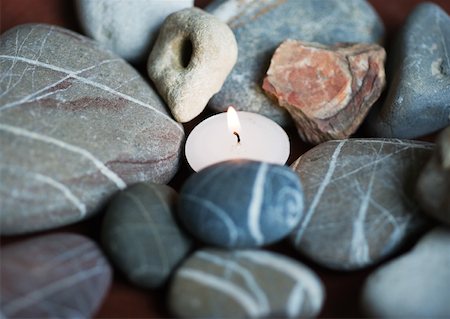 simsearch:600-07966220,k - Candle and stones Stock Photo - Premium Royalty-Free, Code: 633-01272619