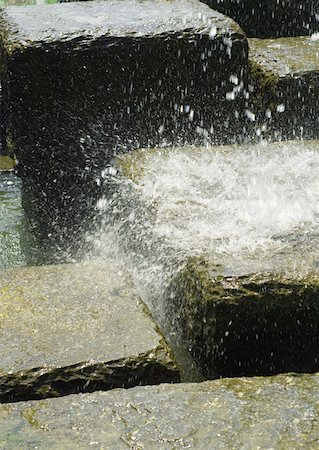 simsearch:696-03400450,k - Water splashing onto stone block Stock Photo - Premium Royalty-Free, Code: 633-01273026