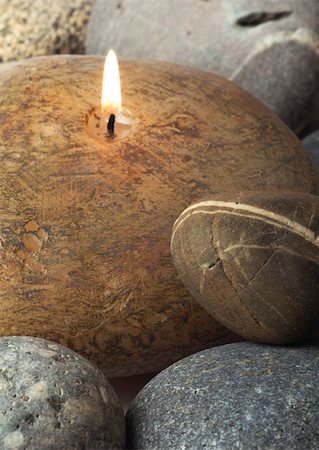 Candle burning, on stones Stock Photo - Premium Royalty-Free, Code: 633-01273606