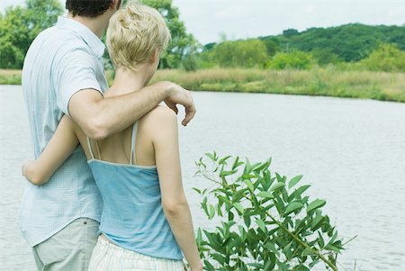 simsearch:696-03402108,k - Couple standing by edge of lake together Stock Photo - Premium Royalty-Free, Code: 633-01574064
