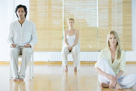 Group meditation, adults sitting in different positions Stock Photo - Premium Royalty-Free, Code: 633-01574636