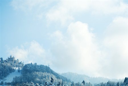 panoramic winter tree landscape - Switzerland, Vaud canton, Lavaux region, snowy mountain landscape with castle Stock Photo - Premium Royalty-Free, Code: 633-01572913