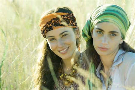 portrait hippies - Two young women sitting in field, portrait Stock Photo - Premium Royalty-Free, Code: 633-01573258