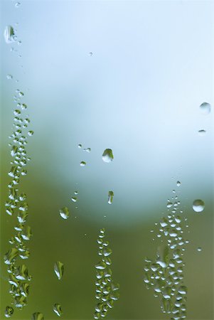 Drops of condensation on window pane Stock Photo - Premium Royalty-Free, Code: 633-01573477