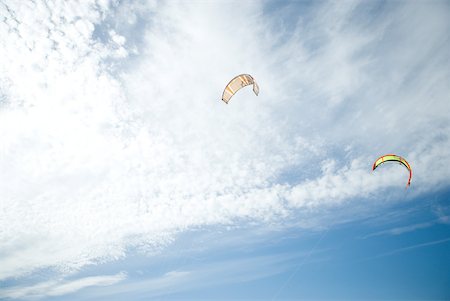 Kites in sky, low angle view Stock Photo - Premium Royalty-Free, Code: 633-01714451