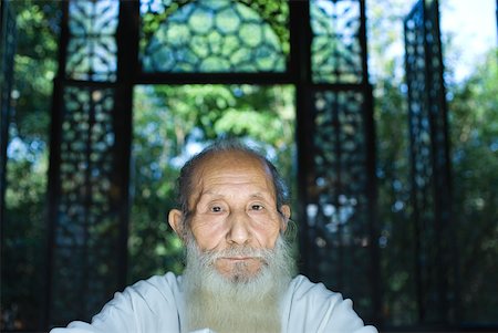 Elderly man with long beard, portrait Stock Photo - Premium Royalty-Free, Code: 633-01714706