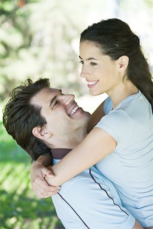 Young couple, man holding woman, waist up Stock Photo - Premium Royalty-Free, Code: 633-01714942