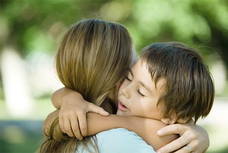 simsearch:695-03375963,k - Mother and son hugging, close-up Stock Photo - Premium Royalty-Free, Code: 633-01714985