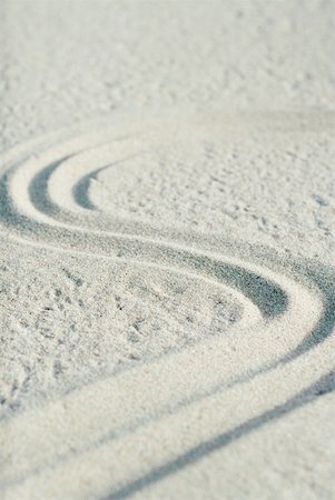 Curve pattern in sand, close-up Foto de stock - Sin royalties Premium, Código: 633-01715491