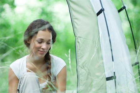 simsearch:633-01714076,k - Young woman next to tent Stock Photo - Premium Royalty-Free, Code: 633-01715645