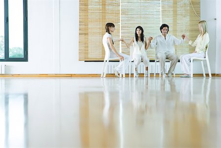 shine floor - Group therapy, adults sitting in chairs, holding hands Stock Photo - Premium Royalty-Free, Code: 633-01713888