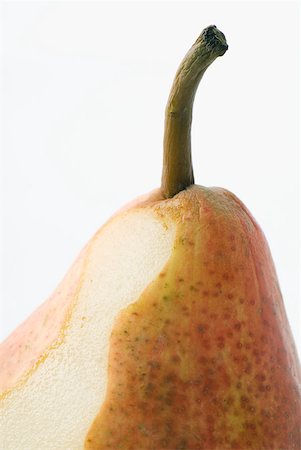 Fresh pear, partially peeled, close-up, cropped Stock Photo - Premium Royalty-Free, Code: 633-01992887