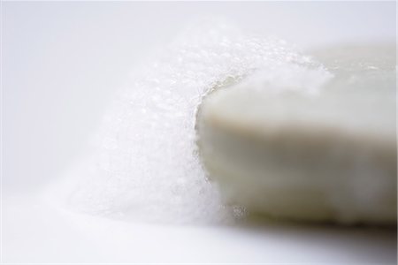 simsearch:633-02231822,k - Bar of soap and soap suds, close-up Stock Photo - Premium Royalty-Free, Code: 633-02044482