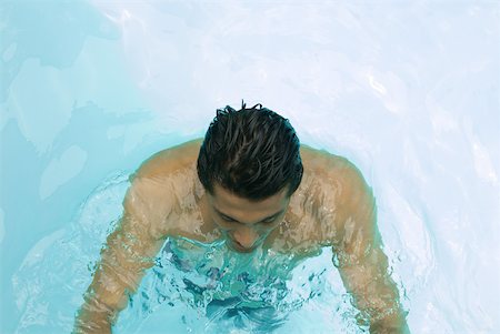 simsearch:400-04391064,k - Man in swimming pool, high angle view Stock Photo - Premium Royalty-Free, Code: 633-02065989
