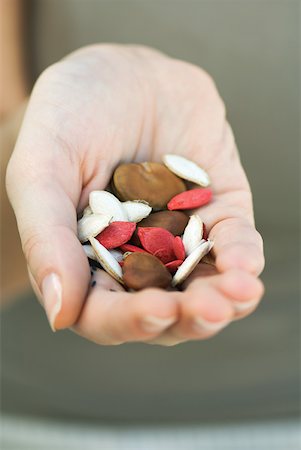 Handful of dry multicolored beans and seeds Stock Photo - Premium Royalty-Free, Code: 633-02231743