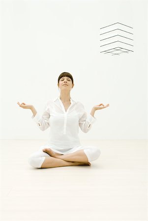 Woman sitting in lotus position, eyes closed Foto de stock - Sin royalties Premium, Código: 633-02231765