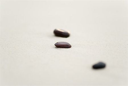 simsearch:633-02345741,k - Small stones on sand, one in focus Stock Photo - Premium Royalty-Free, Code: 633-02345746