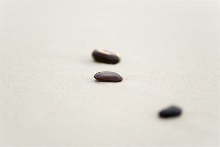 scatter - Small stones on sand, one in focus Stock Photo - Premium Royalty-Free, Code: 633-02345746