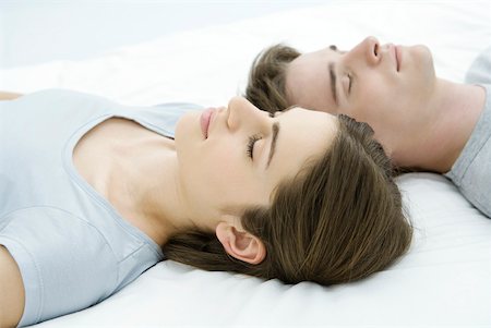 simsearch:632-01149081,k - Couple sleeping, heads side by side Stock Photo - Premium Royalty-Free, Code: 633-02345804