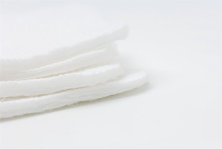 simsearch:6113-06497993,k - Stack of cotton pads, close-up Stock Photo - Premium Royalty-Free, Code: 633-02345825