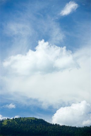 simsearch:696-03395477,k - Stratus clouds over wooded hill Stock Photo - Premium Royalty-Free, Code: 633-02417629
