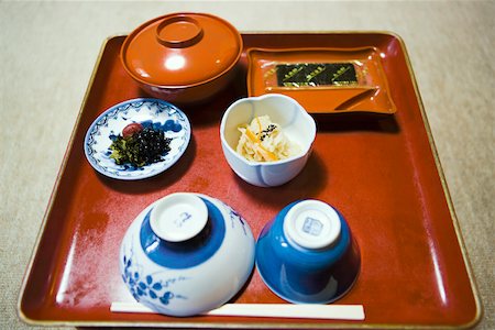 Japanese meal on tray with seaweed and cabbage Stock Photo - Premium Royalty-Free, Code: 633-02417863