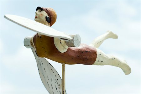 Whirligig en bois sculpté en forme de nageuse Photographie de stock - Premium Libres de Droits, Code: 633-02417952