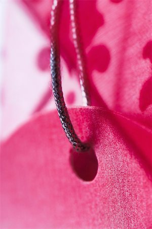 pink cloth - Pink gift tag, extreme close-up Stock Photo - Premium Royalty-Free, Code: 633-02418052