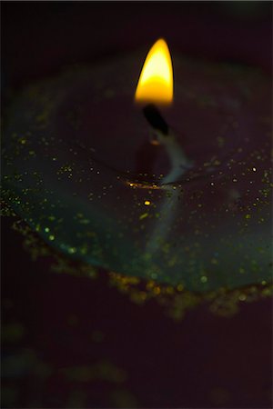 Candle burning in darkness, close-up Stock Photo - Premium Royalty-Free, Code: 633-02418053