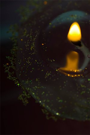 Candle burning in darkness, extreme close-up Stock Photo - Premium Royalty-Free, Code: 633-02418085