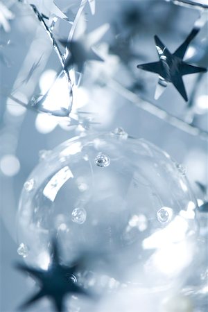 simsearch:633-02418074,k - Glass Christmas ornament and star garland, close-up Stock Photo - Premium Royalty-Free, Code: 633-02418086