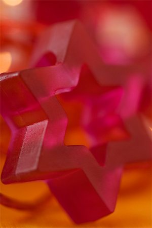 stella di davide - Pink Star of David holiday decoration, close-up Fotografie stock - Premium Royalty-Free, Codice: 633-02418124