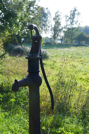 simsearch:633-05401596,k - Old-fashioned water pump in sunny meadow Stock Photo - Premium Royalty-Free, Code: 633-02645444