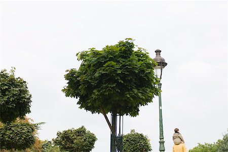 paris streetlight - Parent carrying child on shoulders in park, rear view Stock Photo - Premium Royalty-Free, Code: 633-02691214