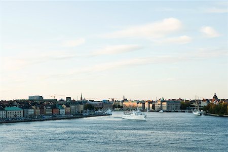 Sweden, Sodermanland, Stockholm, cruise ship crossing canal Stock Photo - Premium Royalty-Free, Code: 633-02691296