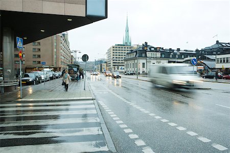 rain and car people - Stockholm, Sweden, traffic moving on street Stock Photo - Premium Royalty-Free, Code: 633-02691352
