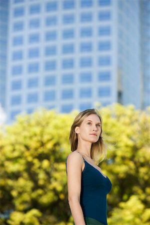 simsearch:633-05401566,k - Woman in tank top standing outdoors, portrait Stock Photo - Premium Royalty-Free, Code: 633-03194565