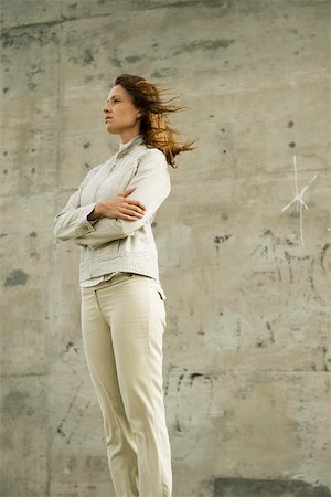 simsearch:649-03566205,k - Woman with arms folded, deep in thought, looking away Stock Photo - Premium Royalty-Free, Code: 633-03194808