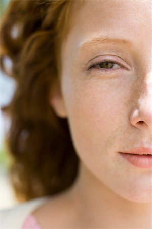 eye contact red hair freckles - Young red-haired woman, close-up Stock Photo - Premium Royalty-Free, Code: 633-03444705