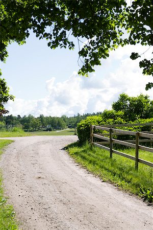 simsearch:633-05401596,k - Dirt road winding through countryside Stock Photo - Premium Royalty-Free, Code: 633-03444760