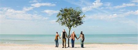 simsearch:633-03445015,k - Ecology conceZS, group of people standing in front of tree, holding hands Foto de stock - Sin royalties Premium, Código: 633-03444971