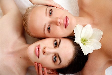 Beauty shot of two young faces side by side Stock Photo - Premium Royalty-Free, Code: 644-01435944