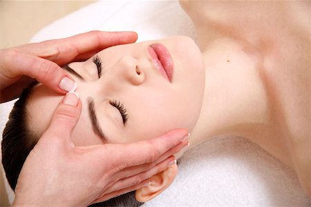 Woman having facial massage Stock Photo - Premium Royalty-Free, Code: 644-01435959