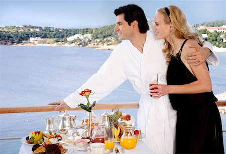 Couple having breakfast on hotel terrace Foto de stock - Sin royalties Premium, Código: 644-01436138